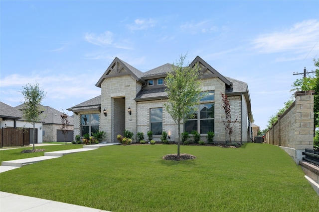 1402 Ethan Cir, Midlothian, TX 76065 - view of front facade featuring stone siding, a shingled roof, and brick siding