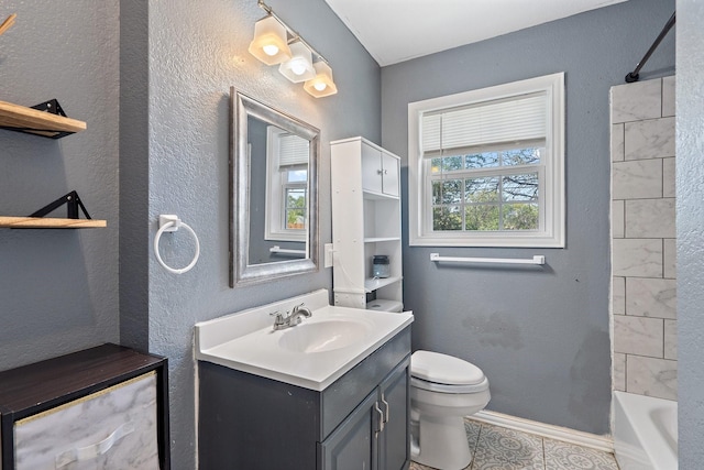 full bathroom featuring tile patterned floors, vanity, shower / bathtub combination, and toilet