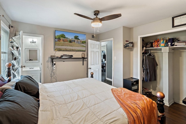 bedroom featuring ensuite bathroom, dark hardwood / wood-style floors, a closet, and ceiling fan