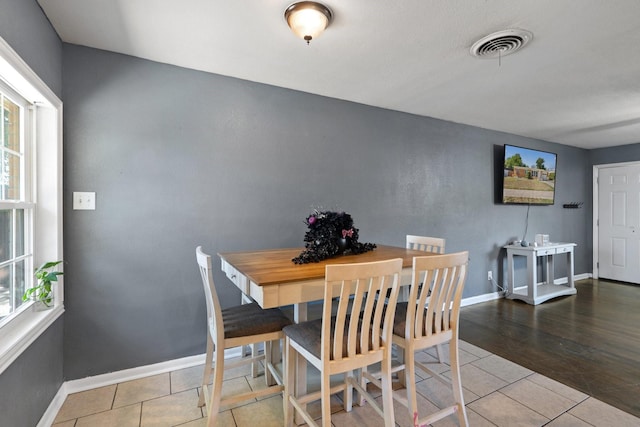 view of tiled dining space