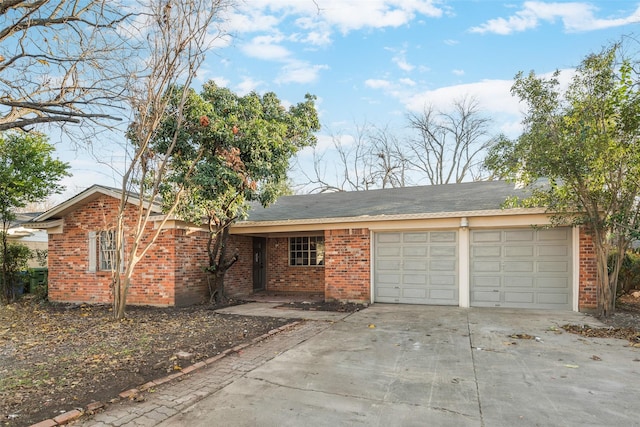 single story home with a garage