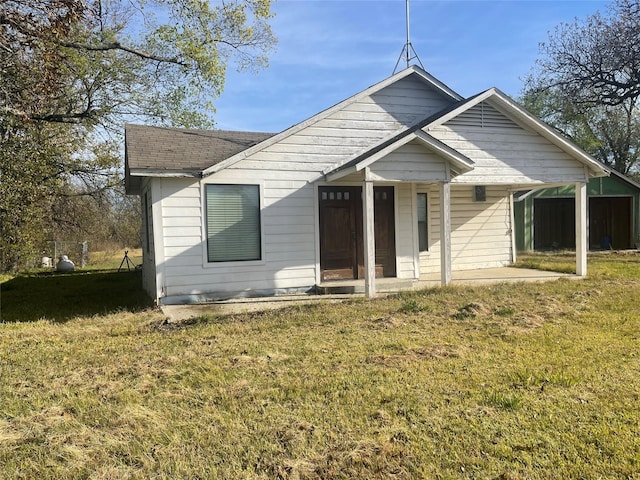 bungalow with a front lawn