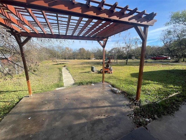 view of patio with a pergola and a playground