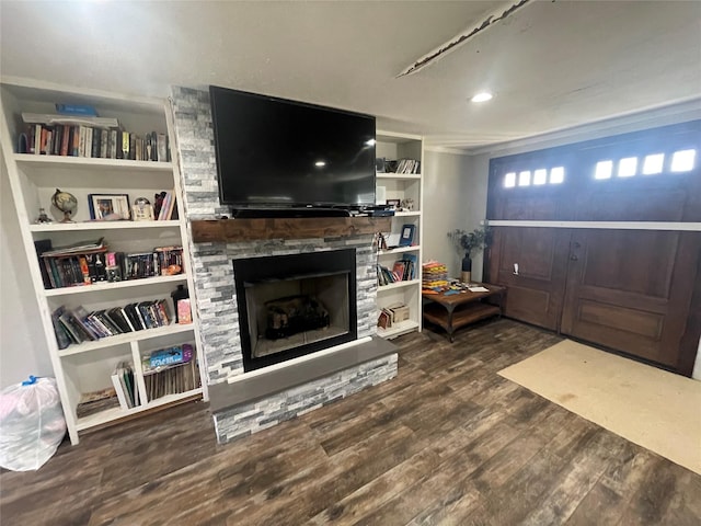 living room featuring a fireplace and hardwood / wood-style floors