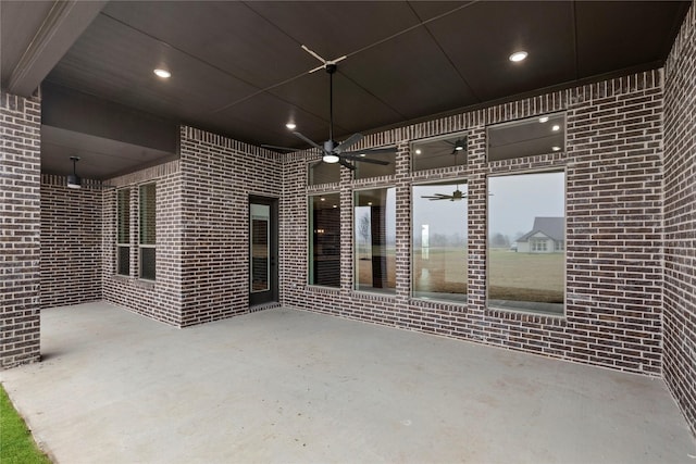 view of patio / terrace featuring ceiling fan