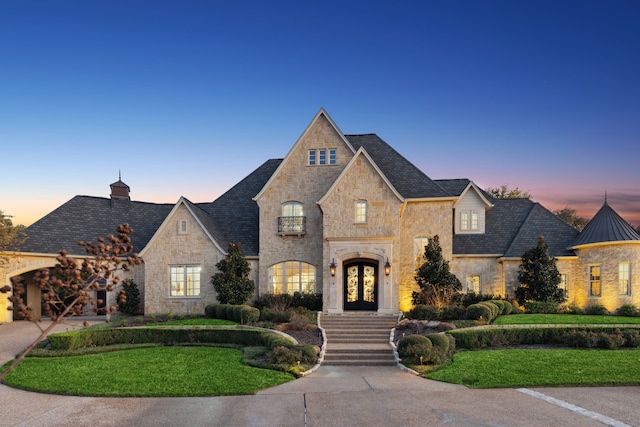 french provincial home with french doors