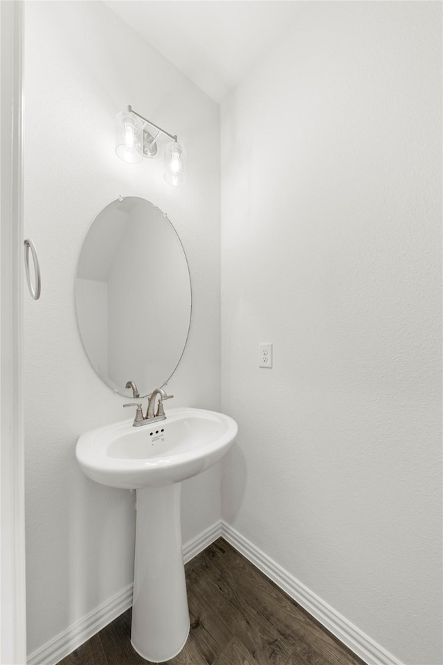 bathroom featuring hardwood / wood-style flooring