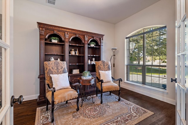 living area featuring dark hardwood / wood-style floors