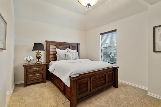 bedroom with light colored carpet