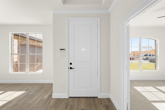 spare room featuring carpet flooring, ceiling fan with notable chandelier, and french doors