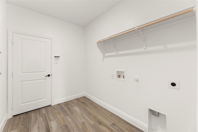 laundry area featuring gas dryer hookup, hookup for a washing machine, and hookup for an electric dryer