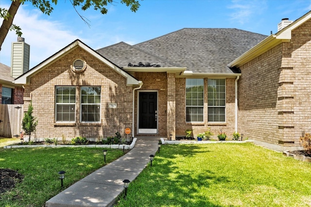 view of front of house with a front yard