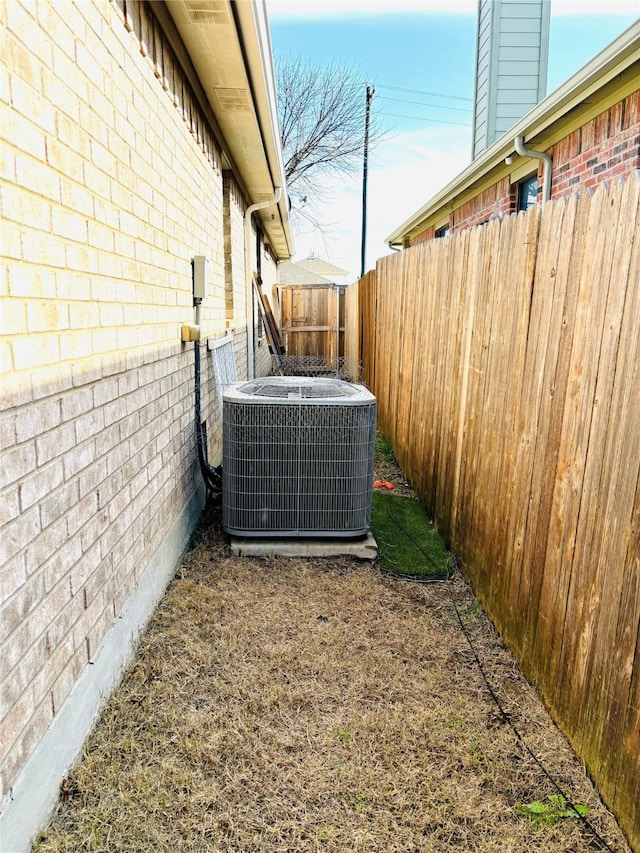 view of yard featuring central AC unit