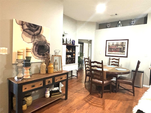 dining room featuring dark hardwood / wood-style floors