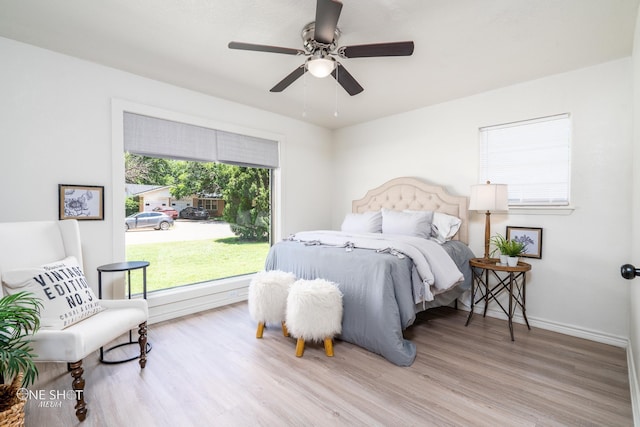 bedroom featuring ceiling fan and wood-type flooring