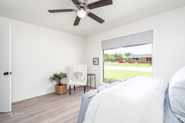 bedroom featuring ceiling fan and light wood-type flooring