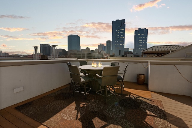 view of patio terrace at dusk