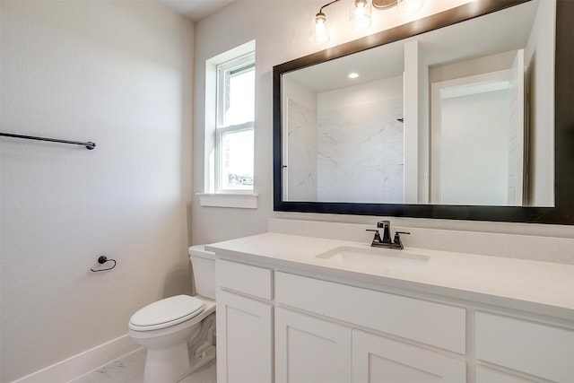 bathroom featuring a shower, vanity, toilet, and a healthy amount of sunlight