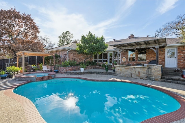 view of pool featuring a pergola, an in ground hot tub, and exterior bar