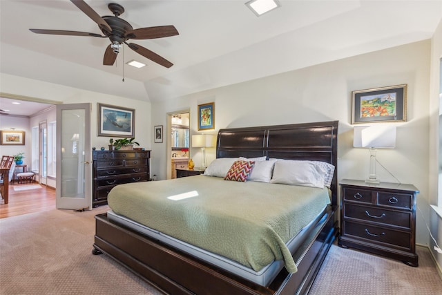 carpeted bedroom with lofted ceiling and ceiling fan