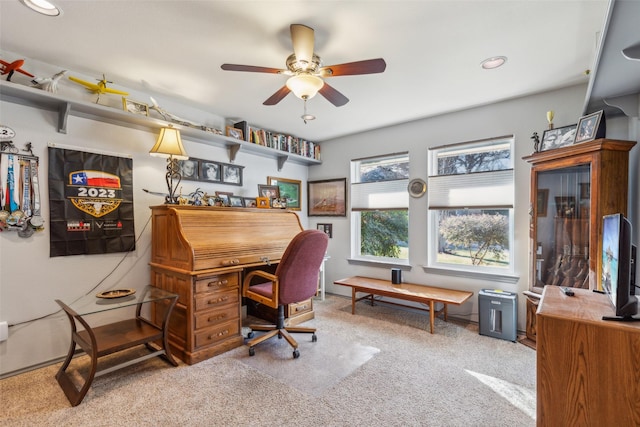 office area featuring ceiling fan and carpet