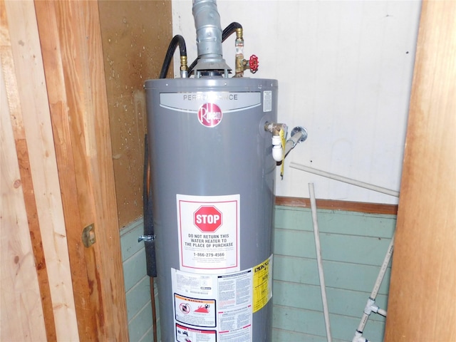 utility room featuring gas water heater