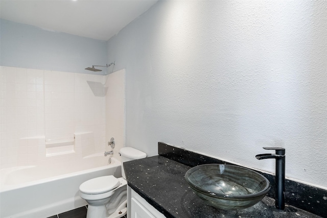 full bathroom with tile patterned flooring, vanity, toilet, and shower / washtub combination