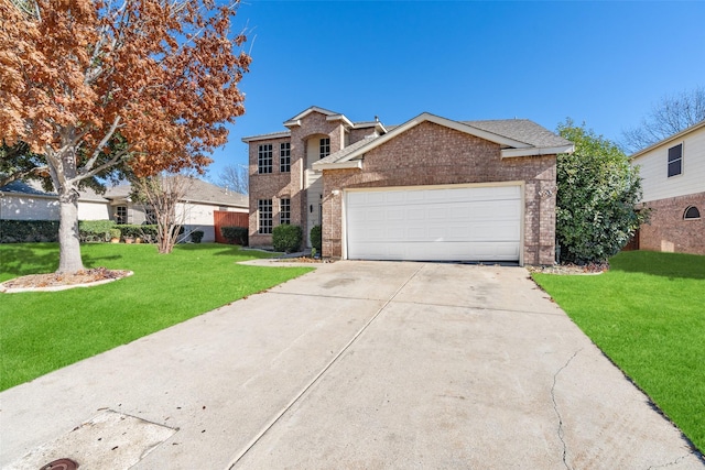 view of front of house with a front lawn and a garage