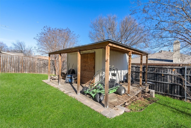 view of outbuilding with a yard