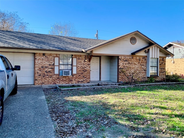 single story home featuring a garage and a front yard