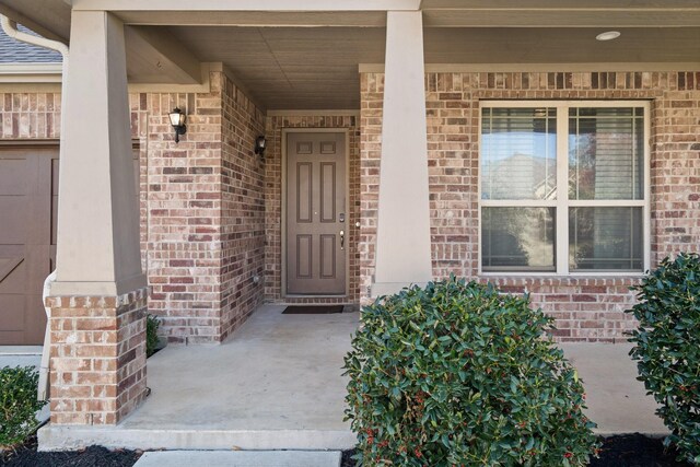 property entrance with a porch