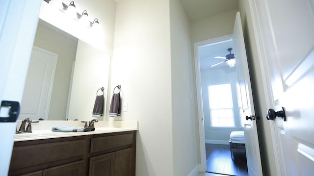 bathroom with vanity and ceiling fan