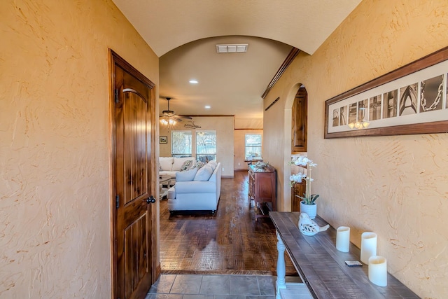 hallway with dark wood-type flooring