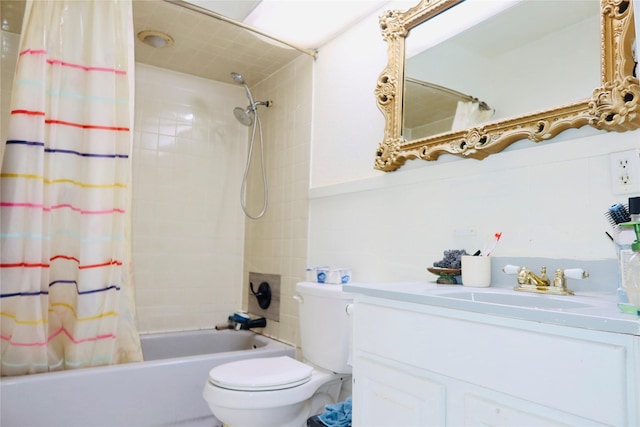 full bathroom with shower / bath combo, vanity, and toilet