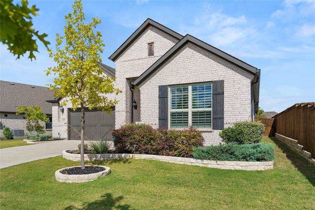 view of front of home with a front lawn