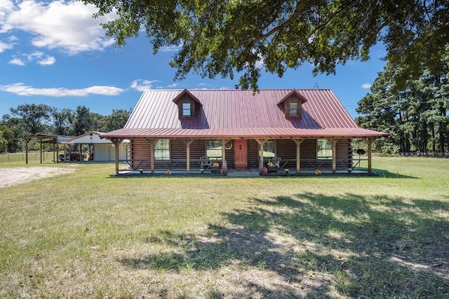 log-style house with a porch, a carport, and a front lawn