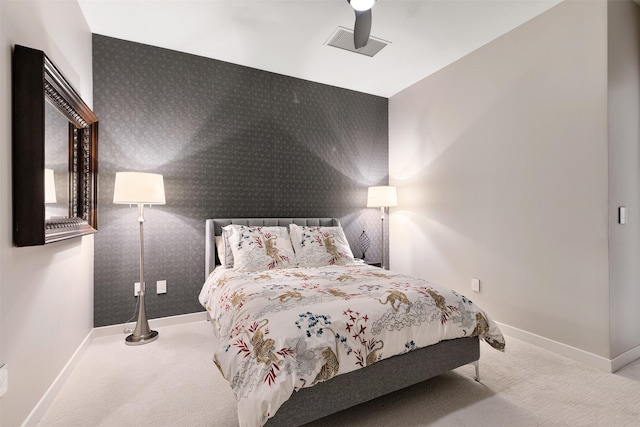 bedroom featuring ceiling fan and carpet floors