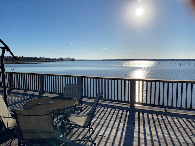 deck featuring a water view