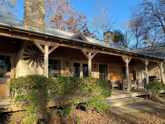 rear view of house with a deck