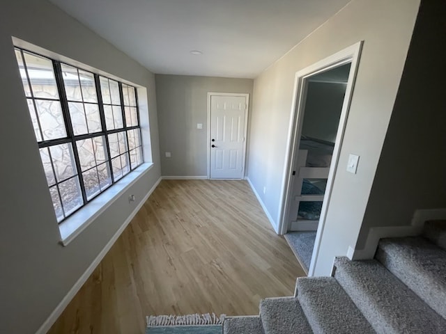 entrance foyer featuring light wood-type flooring