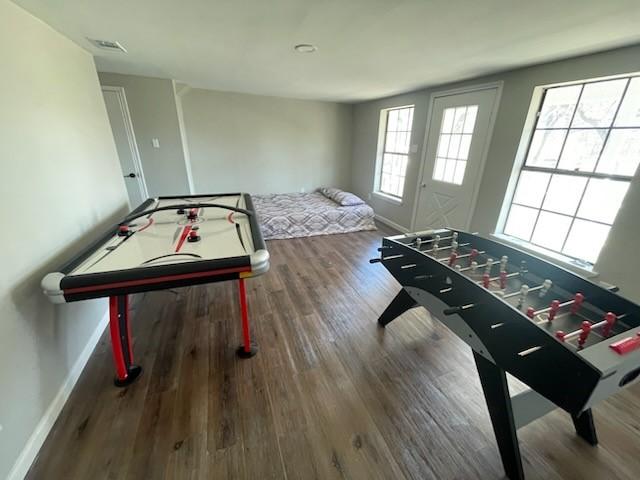 playroom with hardwood / wood-style flooring