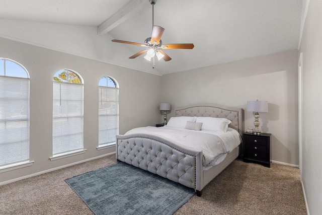 carpeted bedroom featuring vaulted ceiling with beams and ceiling fan