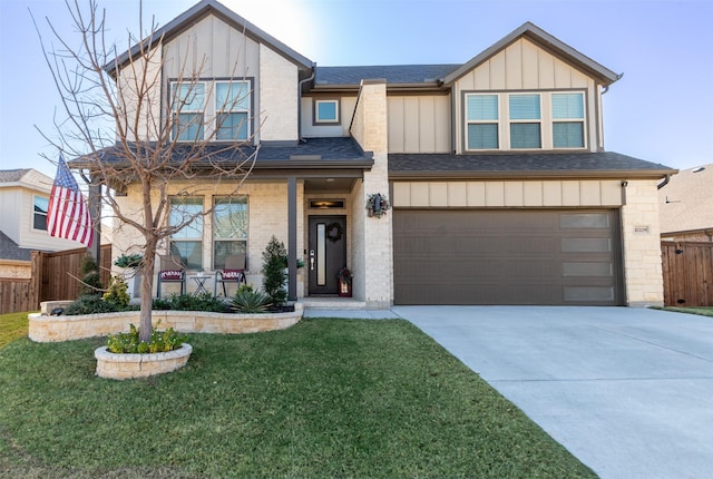 view of front of home featuring a porch, a garage, and a front yard