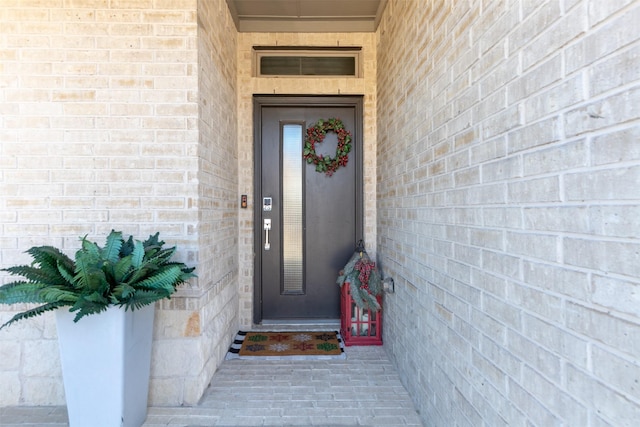 view of exterior entry featuring elevator