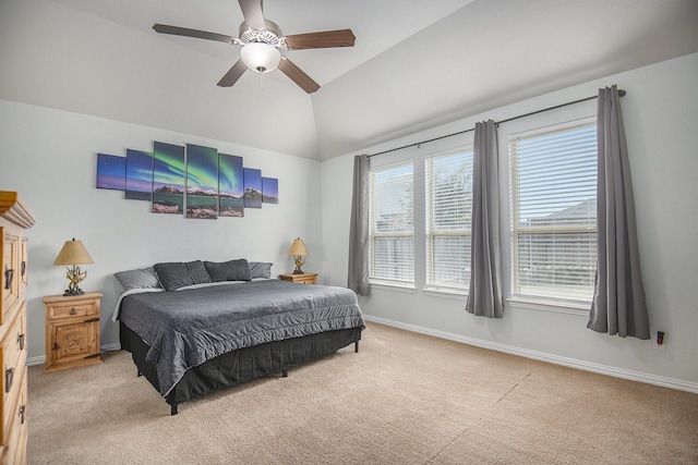 carpeted bedroom featuring ceiling fan and lofted ceiling