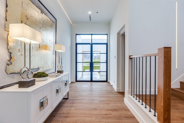 doorway to outside featuring light wood-type flooring