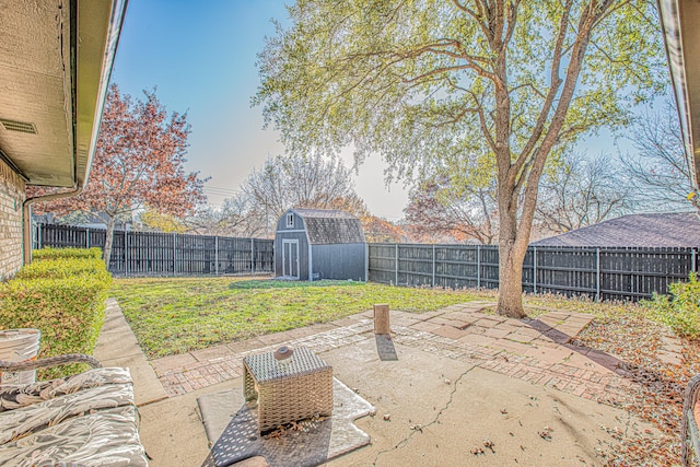 view of patio featuring a shed