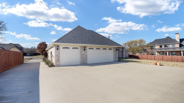 view of side of home with a garage