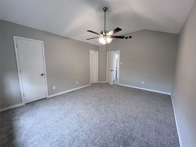 unfurnished room featuring vaulted ceiling, carpet, and ceiling fan