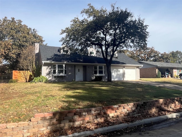 single story home with a front lawn and a garage